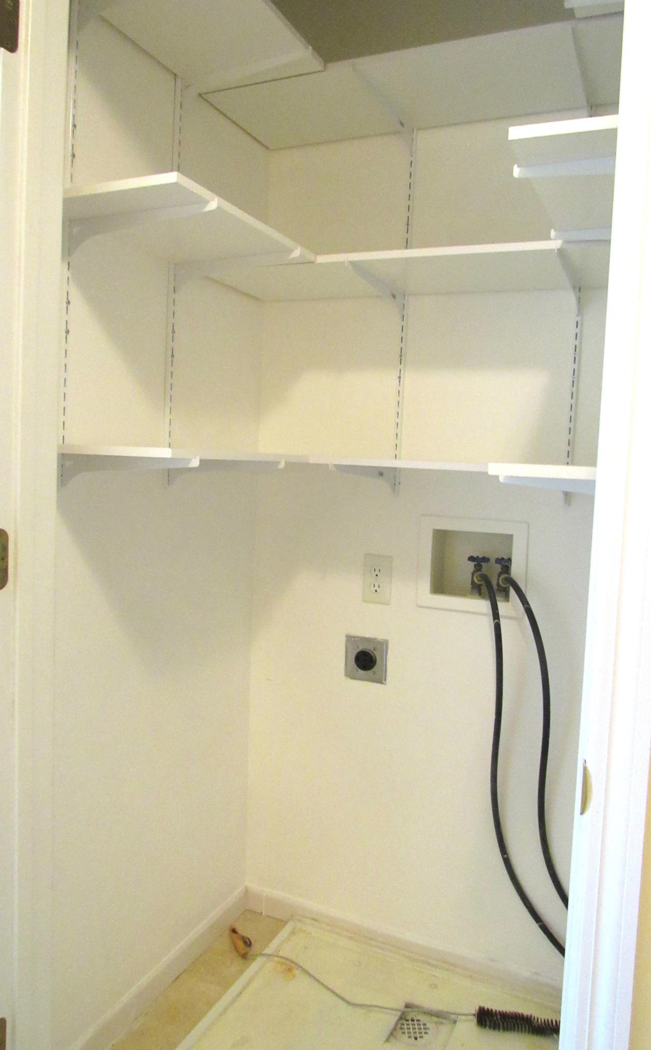 Upper level laundry/linen closet. (The laundry is currently in the the lower level ).