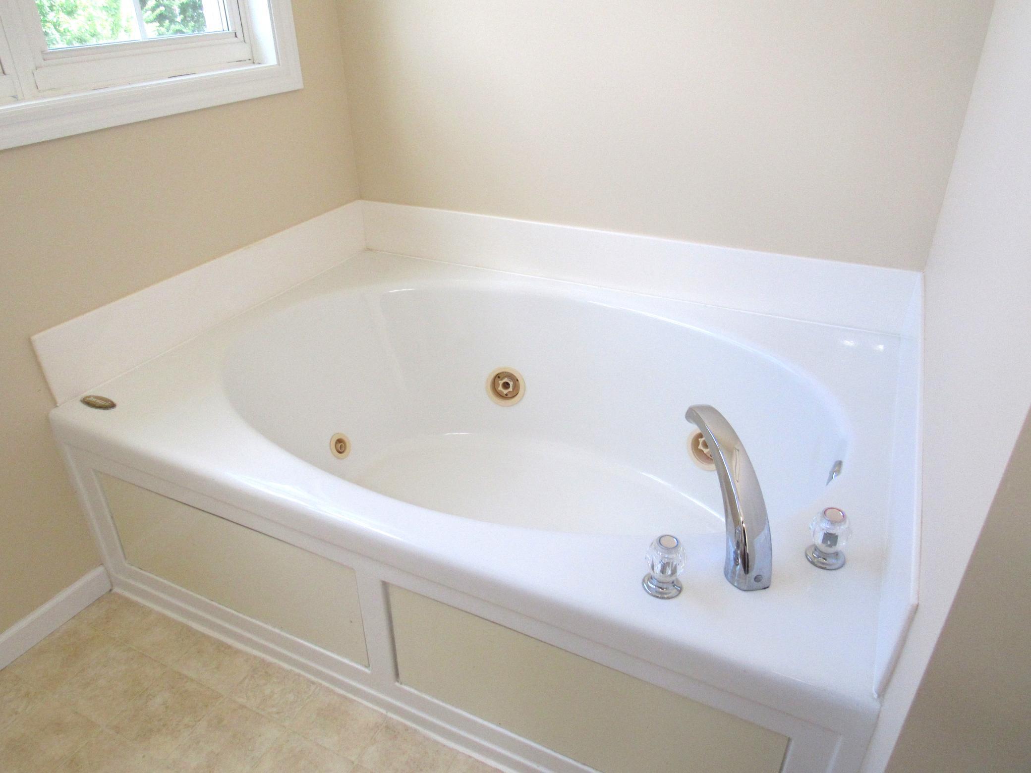 The 4 piece ensuite has a Jacuzzi tub with a new pump. Relax and soak at the end of the day!