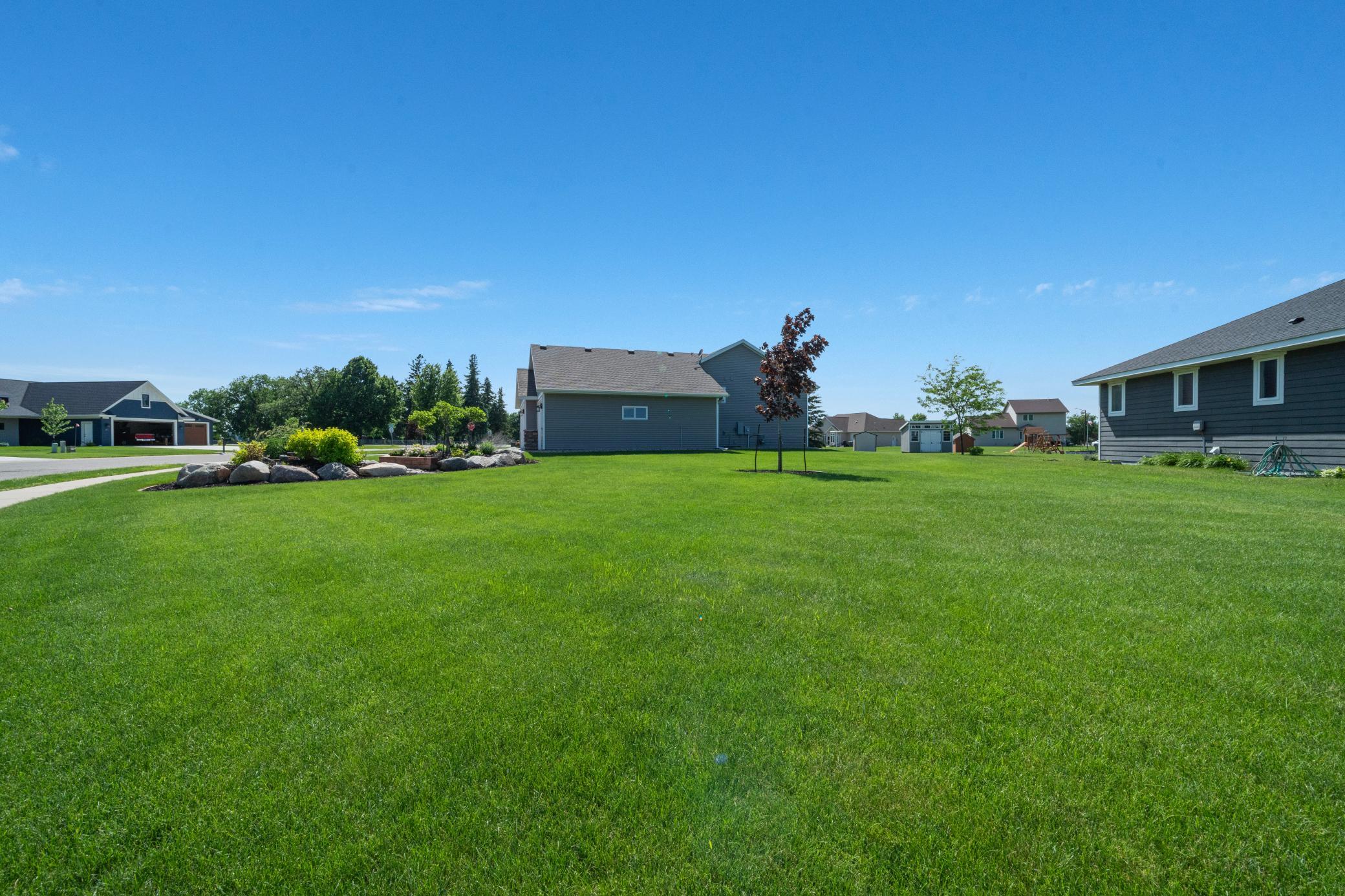 Beautiful maintained yard with sprinkler system