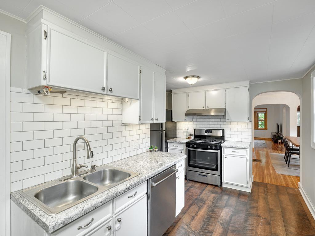Stainless appliances and nice storage await in the kitchen.