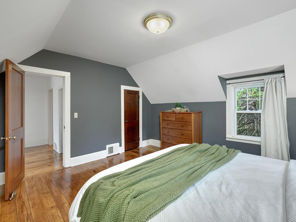 Your primary bedroom with beautiful floors and good natural light.