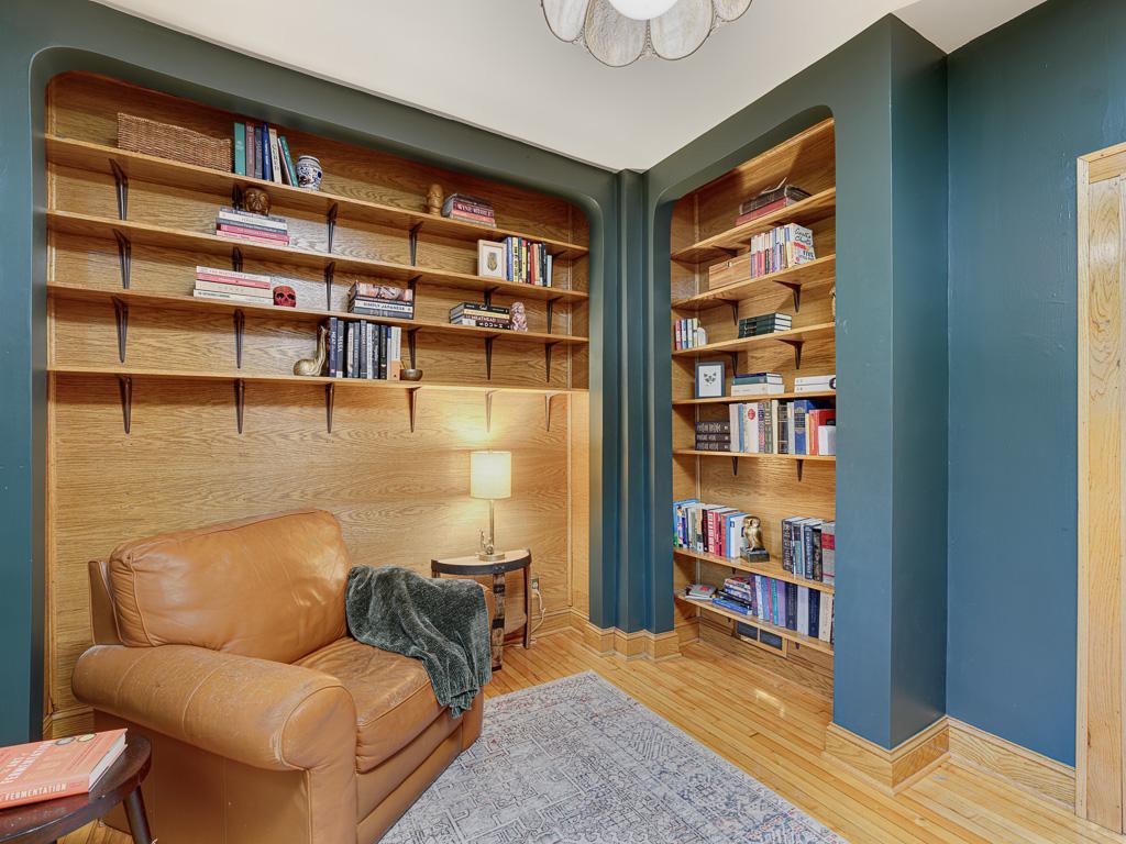 The main level bedroom is a great flex space as a bedroom, office, or tasteful lounge.