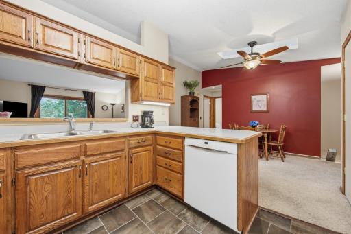 Open kitchen with a spacious breakfast bar and pass-through to the living room, creating an ideal layout for everyday living and entertaining