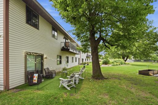 Lots of green space outside with beautiful gardens