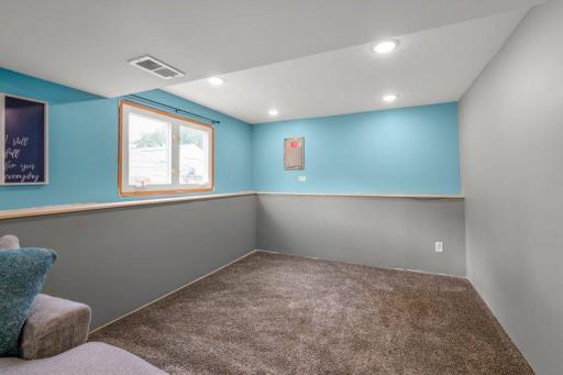 Additional finished lower-level flex space ready to become a home gym, children's play area, hobby room, home office, or future game room to fit your lifestyle.
