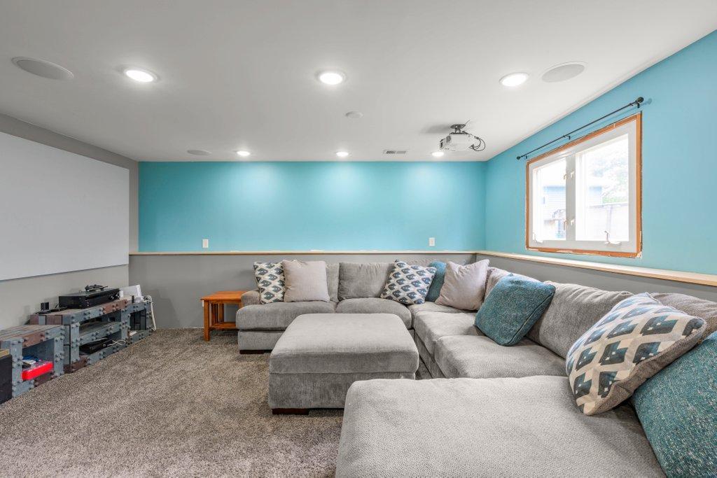 Large finished basement offers the perfect flex space for a home theater, recreation room, playroom, or teen hangout with room for everyone to spread out.
