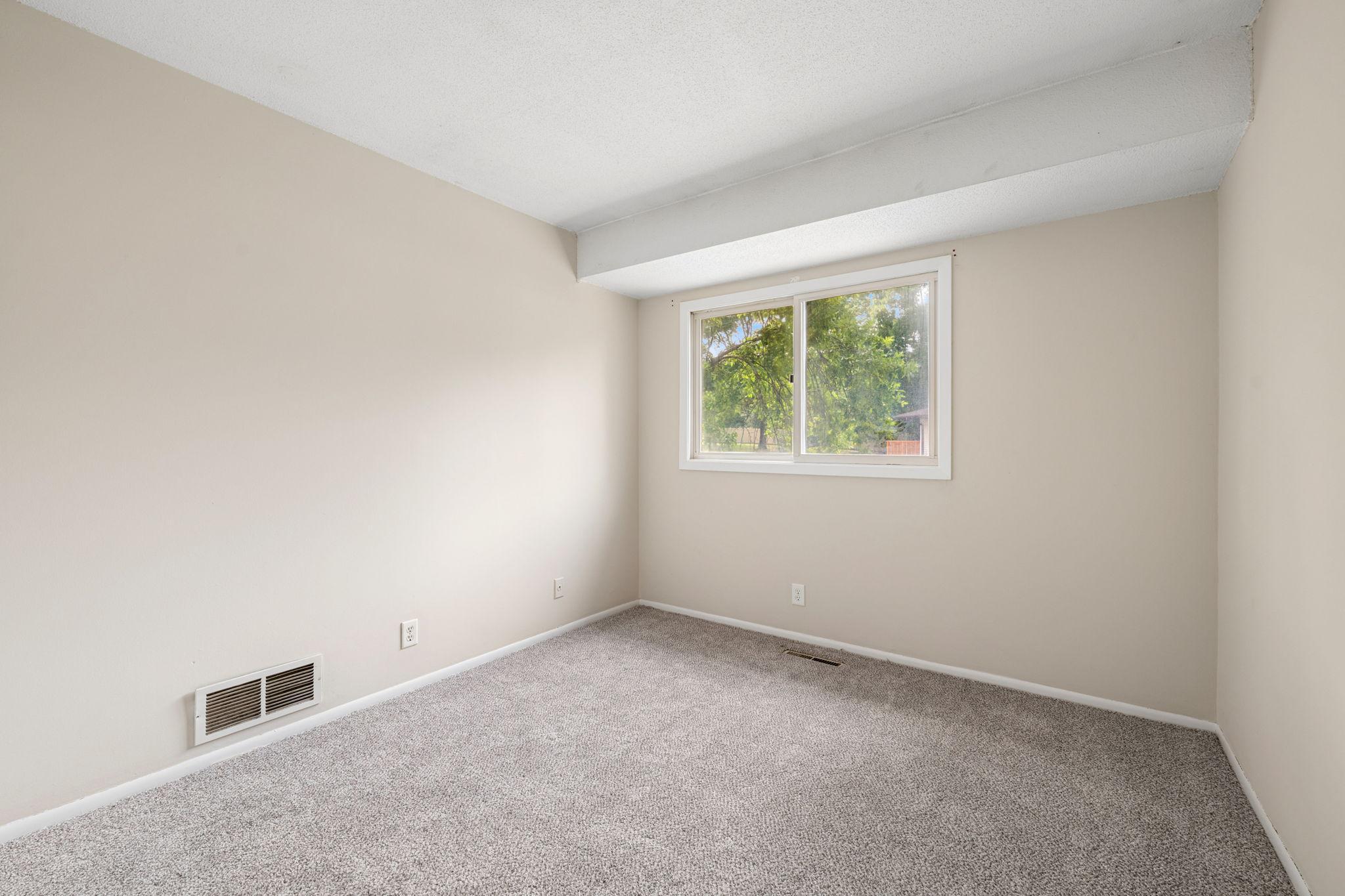 Second upper level bedroom.