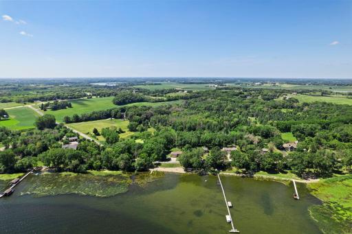 Enjoy lakefront living on rare 4 acres of land