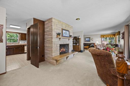 Inside, the main level includes a family room and living room, stone fireplace and a well-appointed kitchen