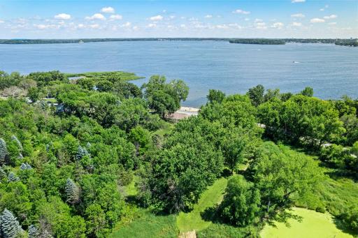 Enjoy the sandy beach, and shady yard with so much room for expansion however your heart desires!