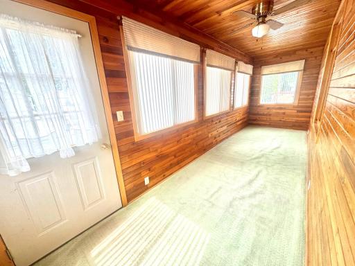 Front porch is loaded with windows