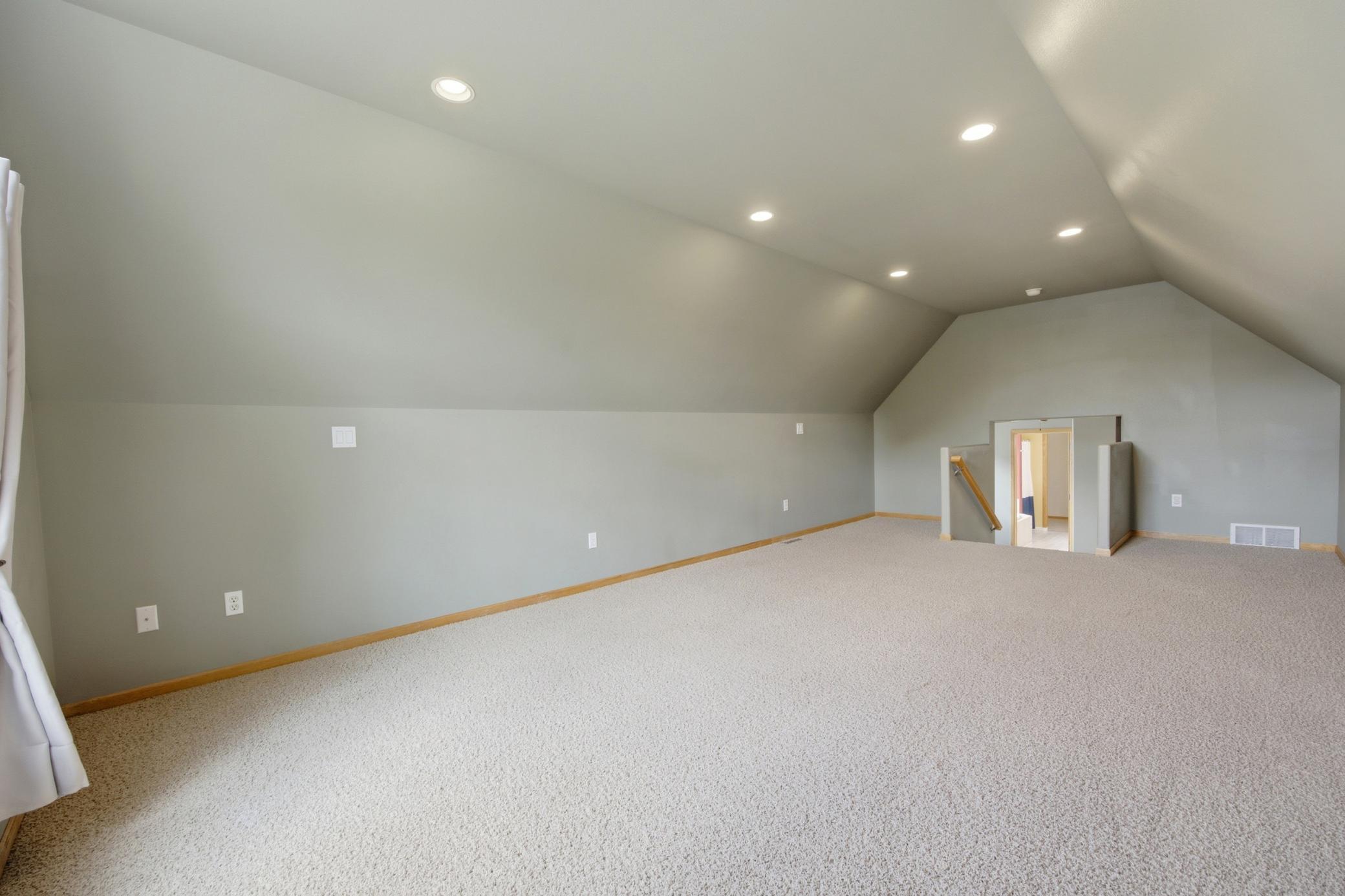 Primary bedroom/over garage space