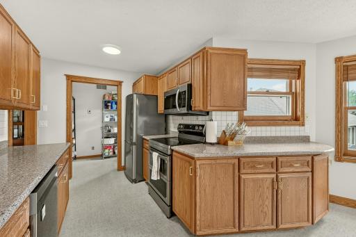 Kitchen with new oven and microwave.