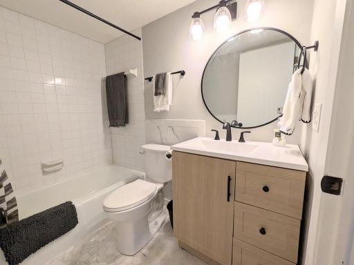 Bathroom with new vanity, faucet and toilet