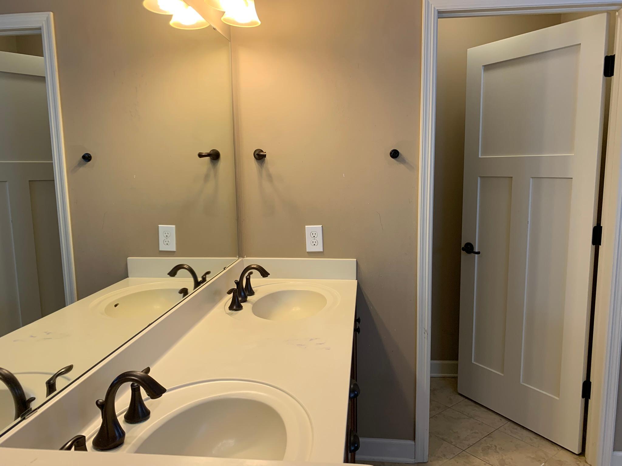 21 - Primary bath - dual sinks.JPEG