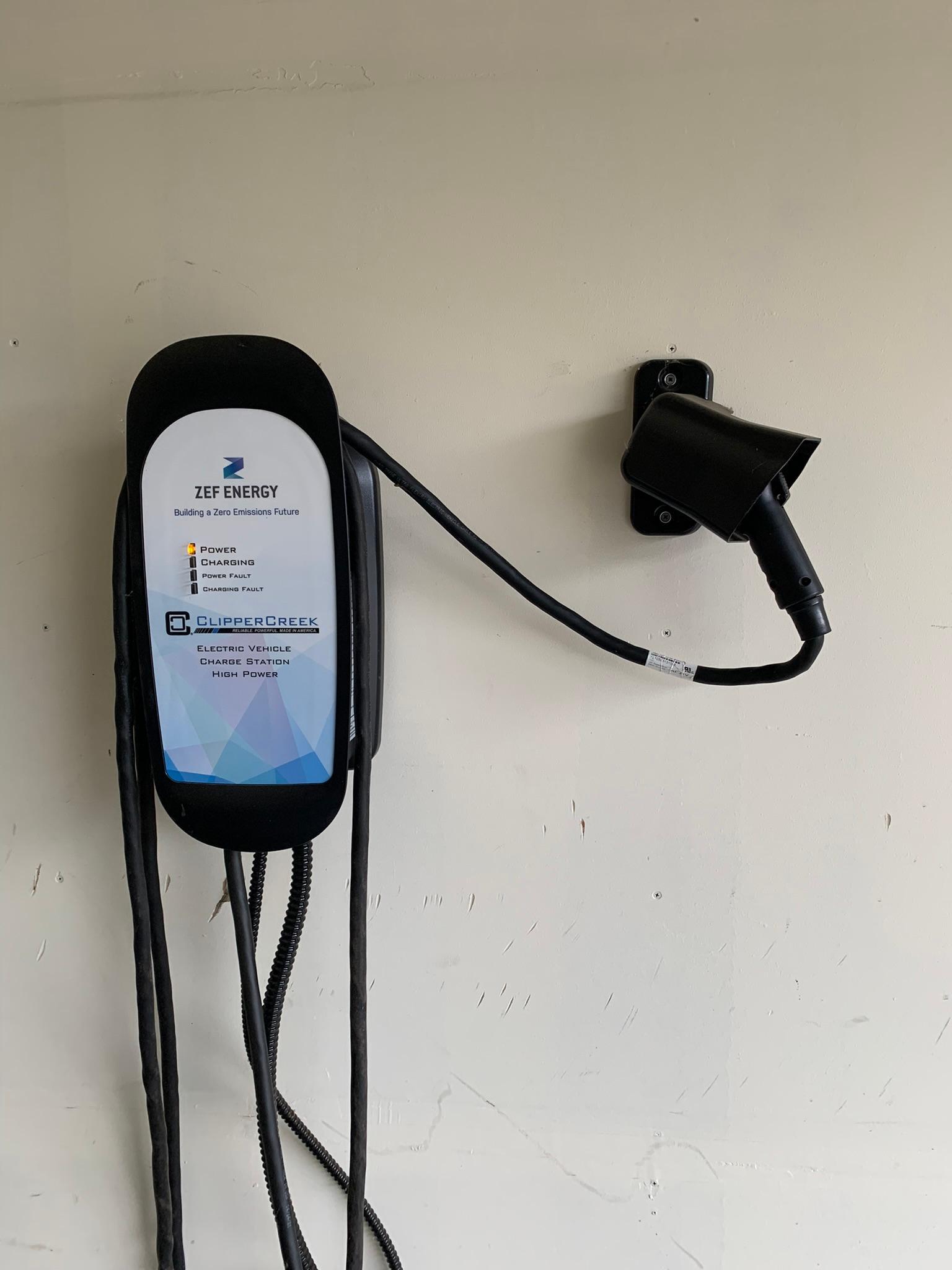 37 - Electric car charging station in garage.JPEG