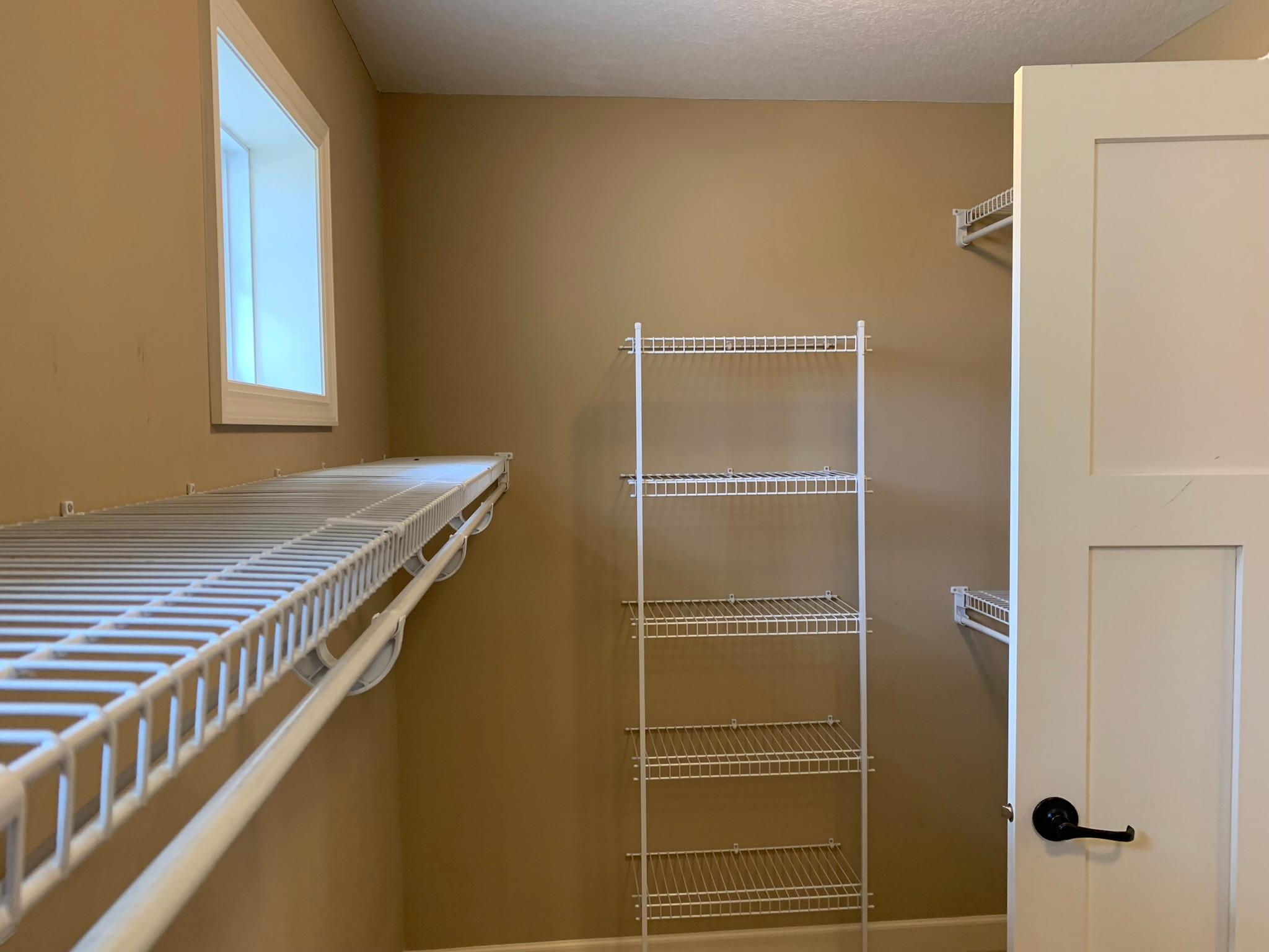 24 - Primary walk in closet.JPEG