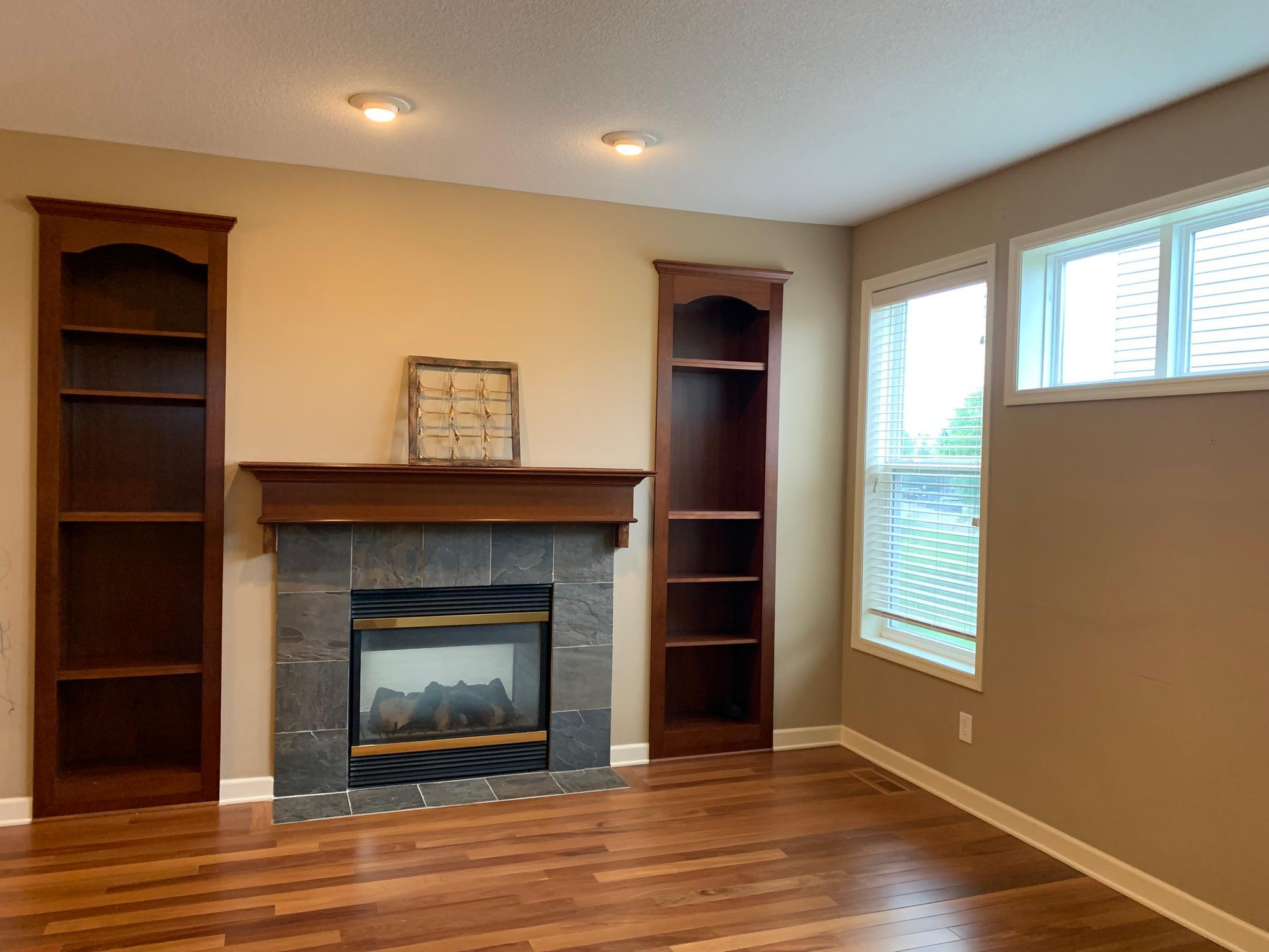 2 - Step inside this home and your first view is the light filled main floor living room.JPEG