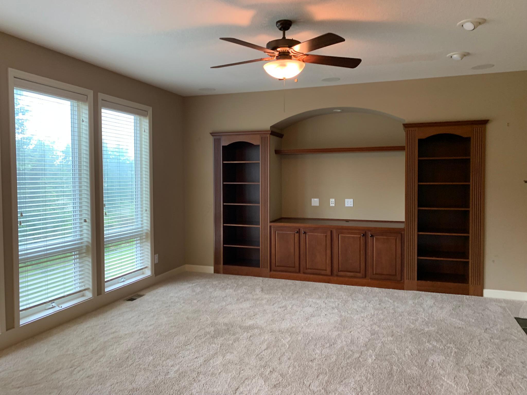 8 - Large windows in main floor family room bring in plenty of light.JPEG