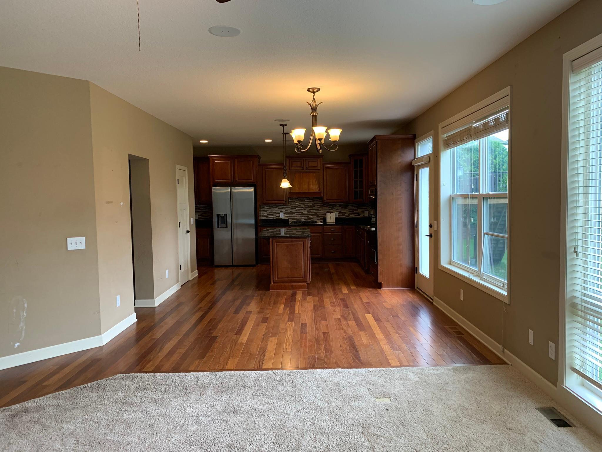 10 - View from family room into informal dining area and kitchen.JPEG