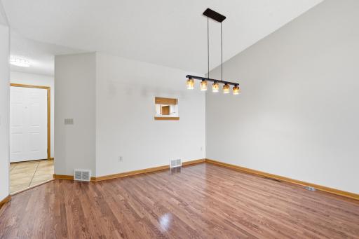 Dining room next to the pass-through window and with updated lighting