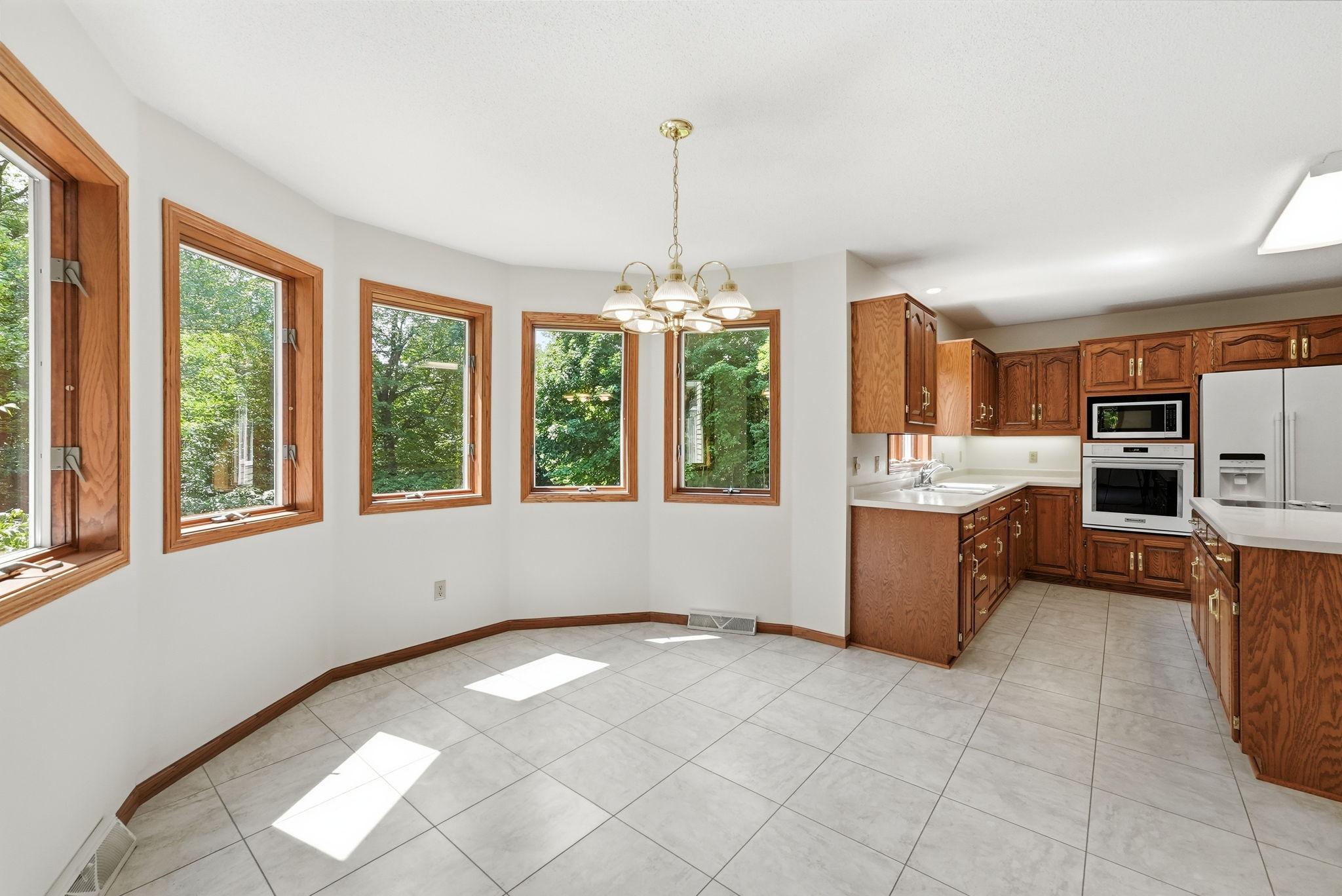 Sunlit dining nook provides a comfortable setting for casual dining.