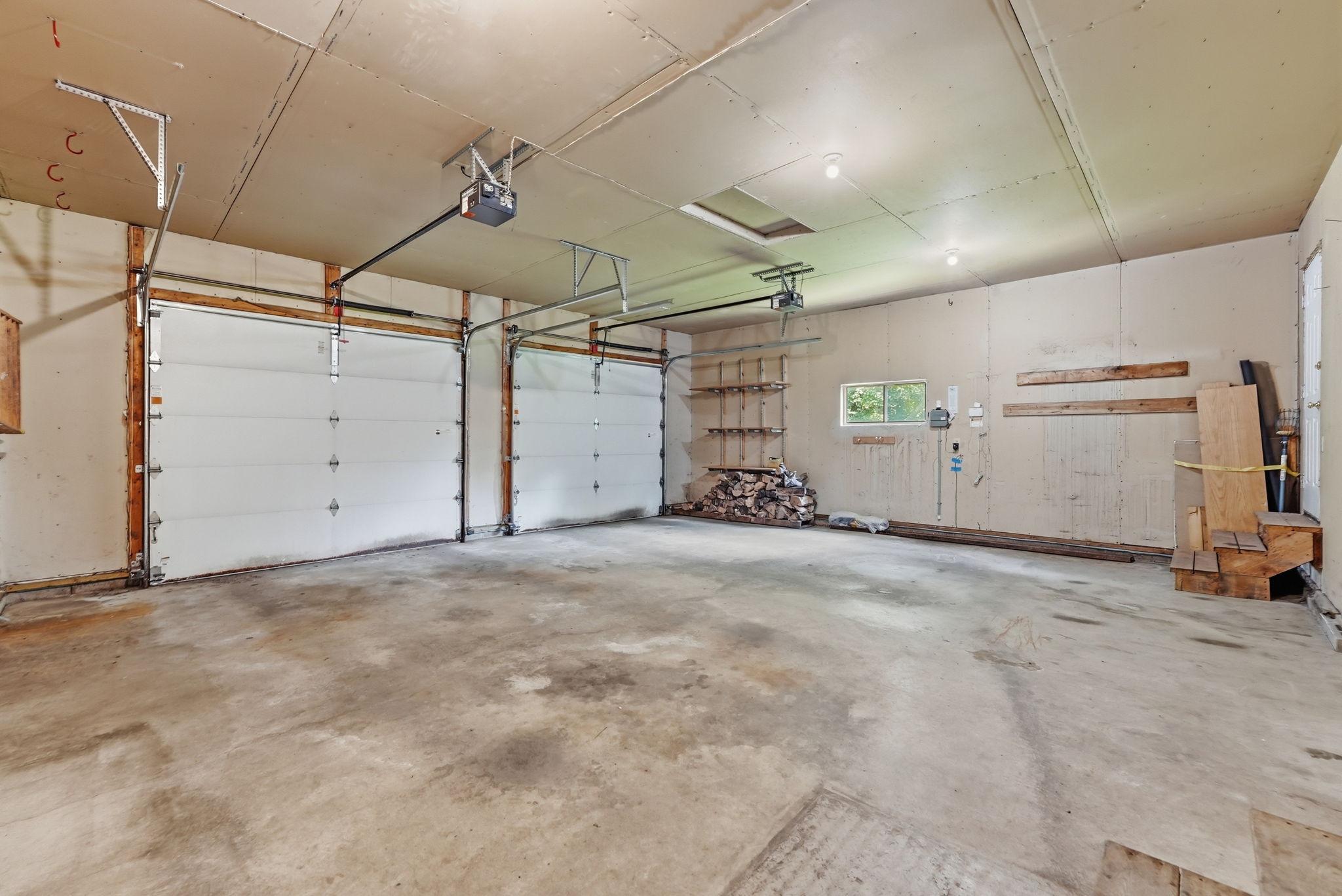 Take a peak inside the spacious garage.