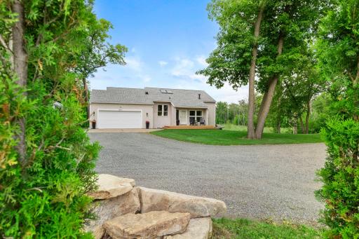 The inviting front view is accented with architectural flare.