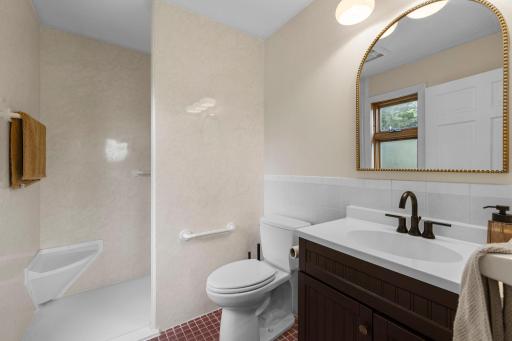 The owners private bathroom has a 'walk-in' shower.