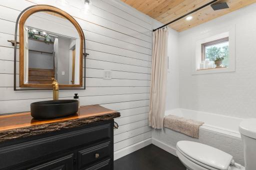 The full lower level bathroom was recently remodeled.