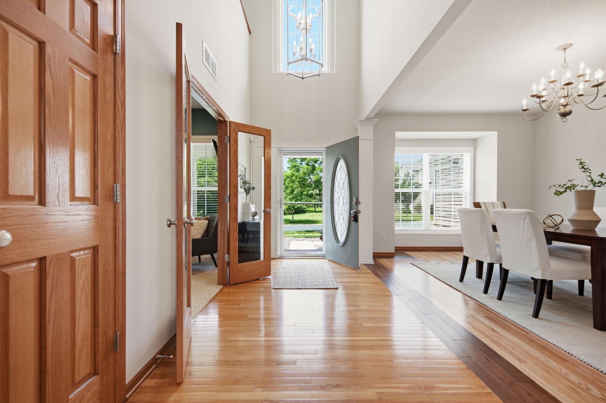 This two-story foyer fills the home with abundant natural light.