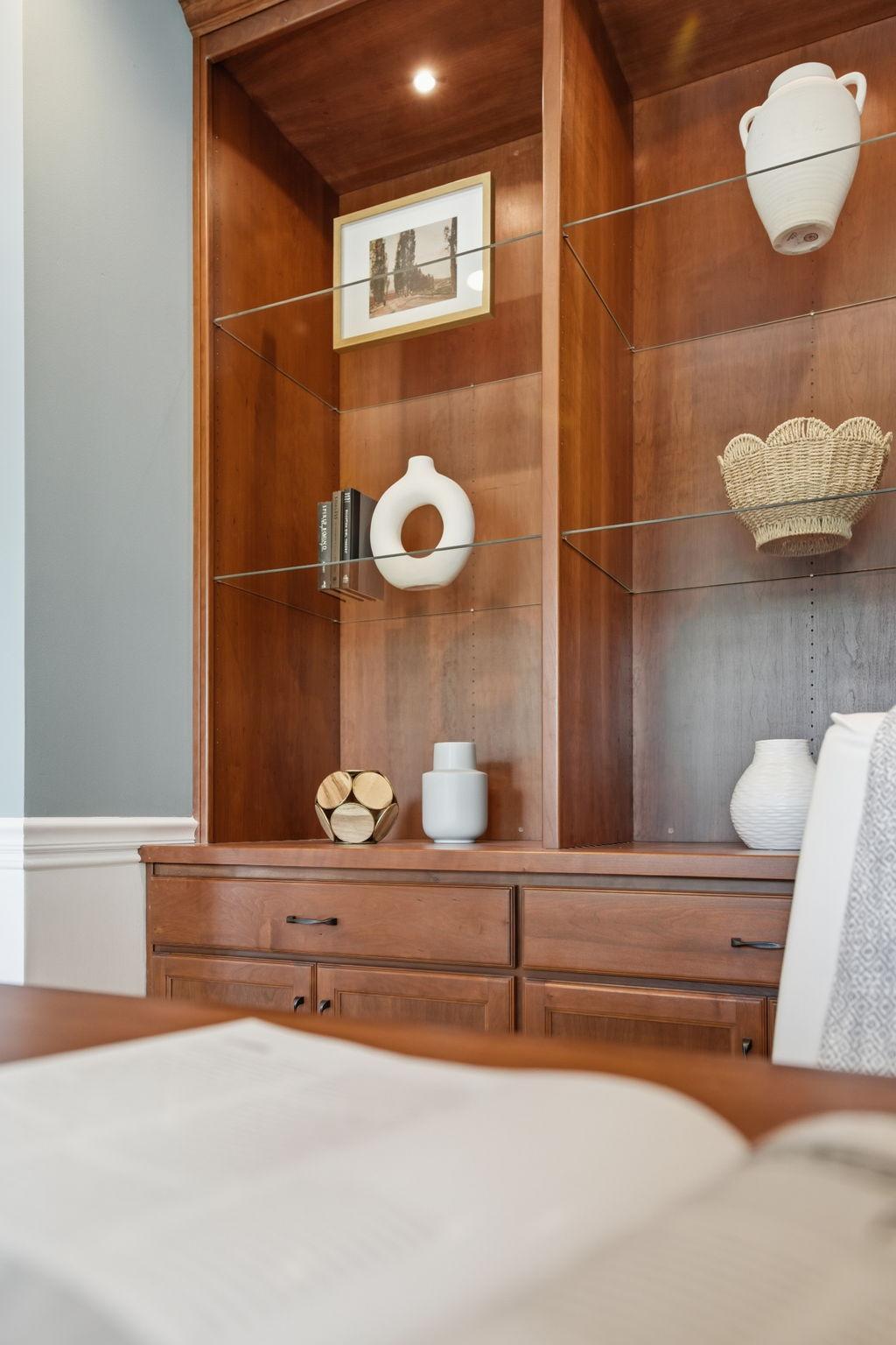A close up of the custom shelving - Cherry woodwork!