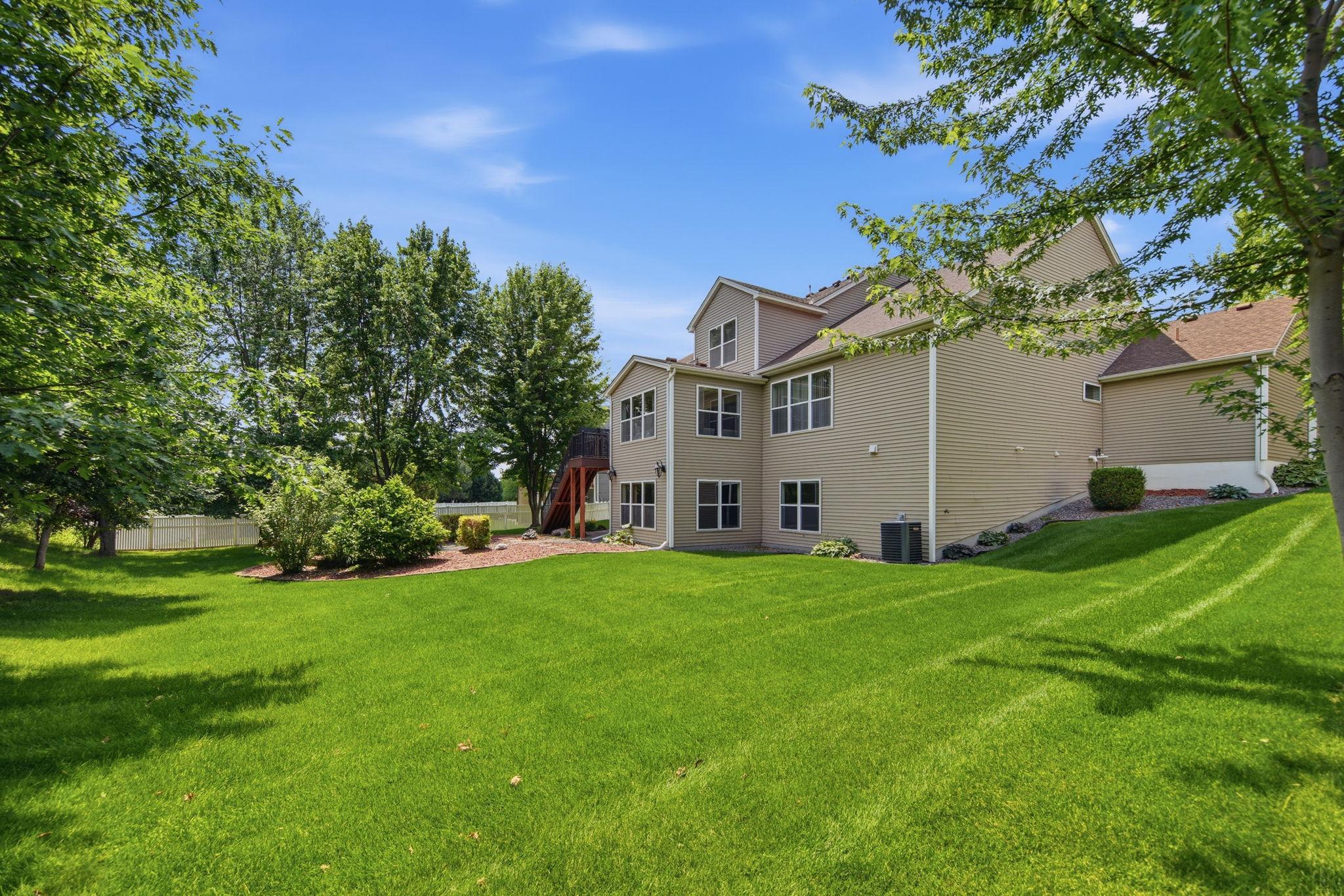The spacious backyard provides ample room for play, entertaining, and enjoying outdoor activities.
