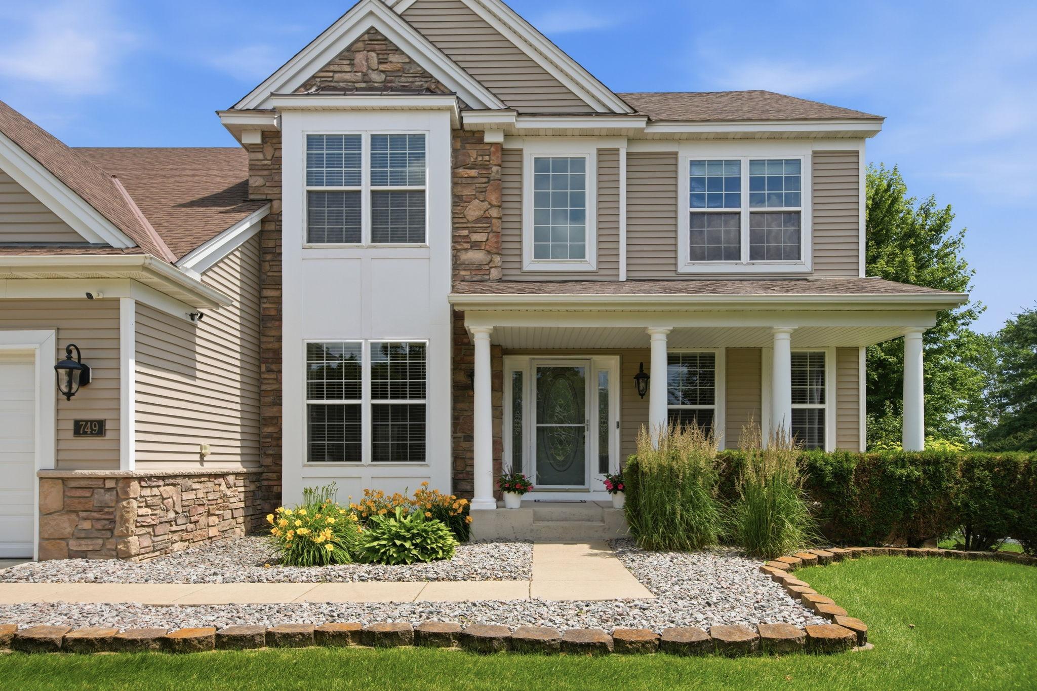 This beautiful custom Pulte-built home welcomes you with an impressive two-story foyer, creating a grand and elegant entrance with stone and maintenance free siding. Buyers put over $100K into the home! $140 a square foot - you can't beat the price!