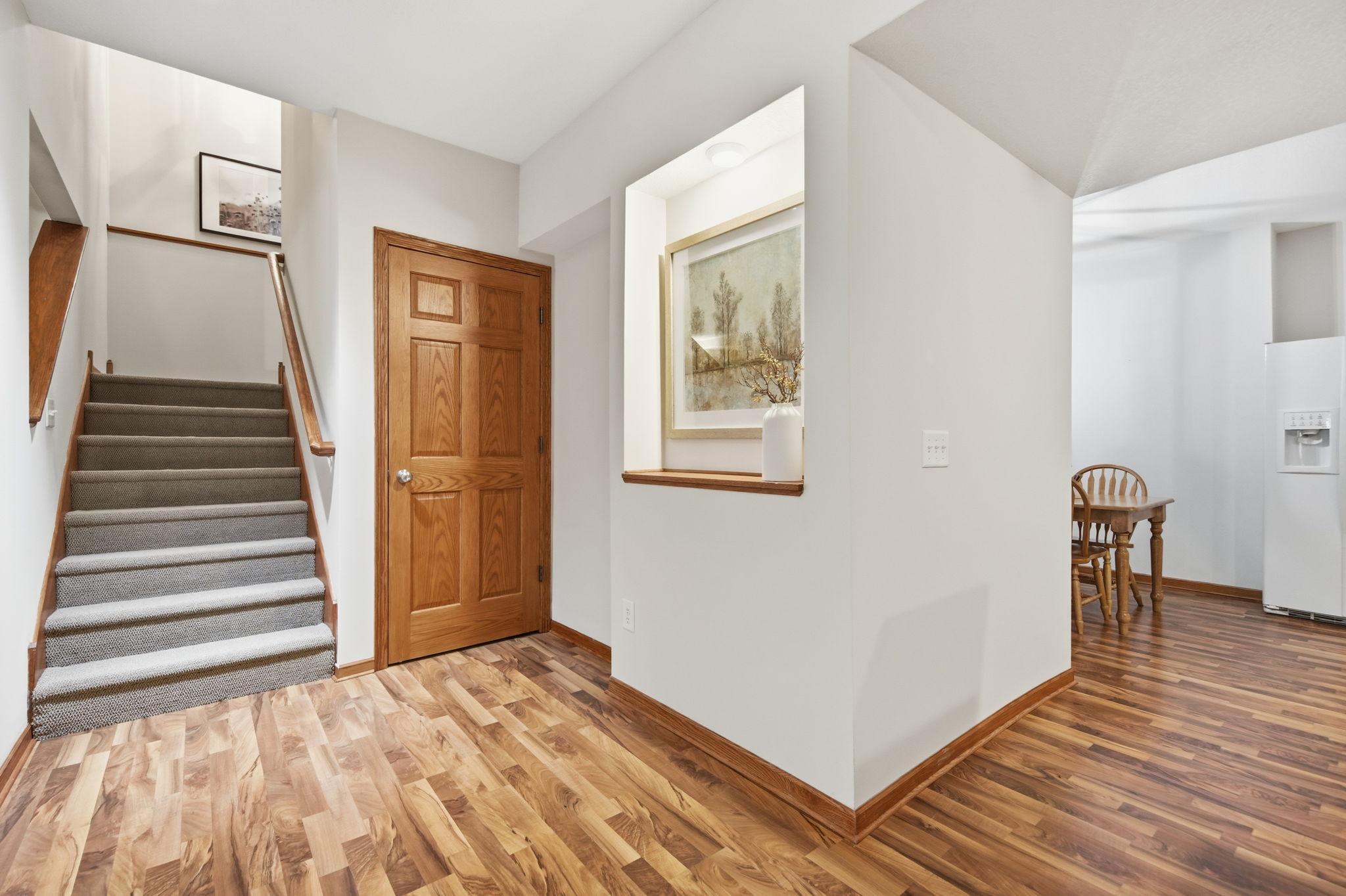 Designed with entertaining in mind, the Lower Level offers an impressive array of amenities, including a full kitchen, dining room, laundry room, guest bedrooms, a spacious living and billiards area, fitness or play space, and private theatre room