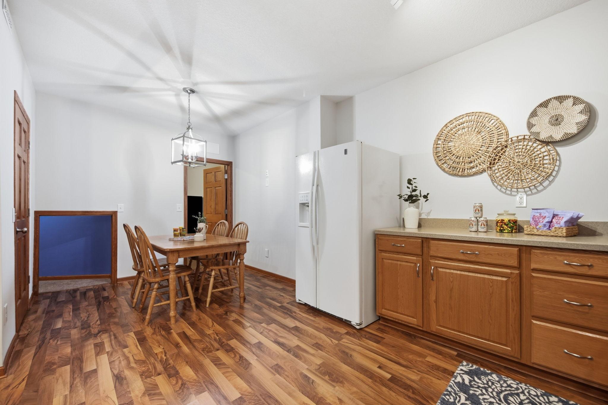 Another view of the kitchen and to the right is a storage room and on the left is a cubby for kids "Secret hang out room".