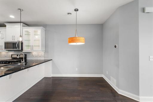 Spacious dining area and room for several stools at the counter
