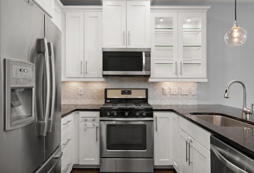 Great kitchen design, with SS appliances and Granite counters