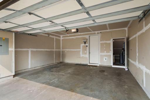 Garage with water spigot, and storage room with water softener