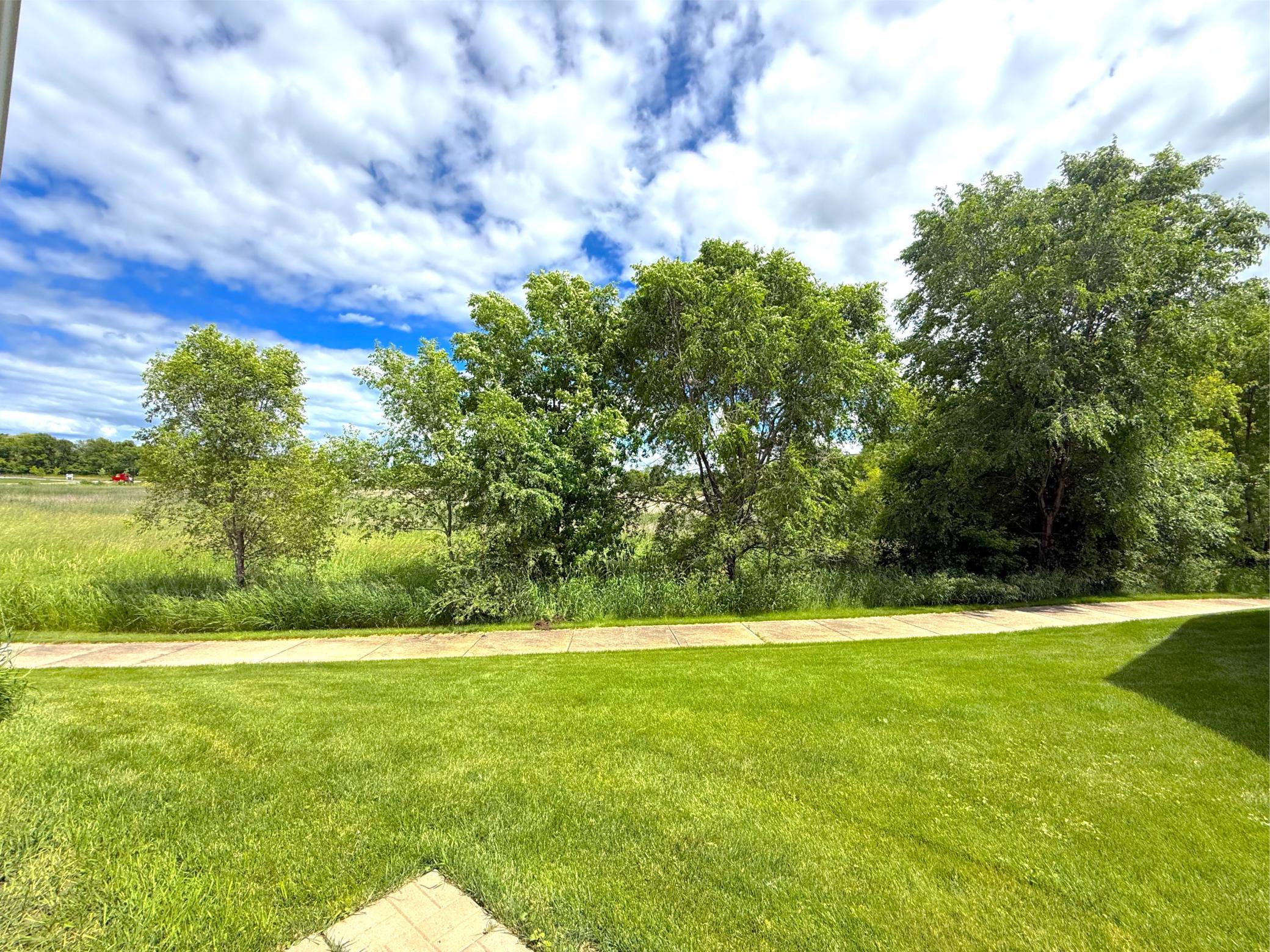 Nothing but open space behind the home.