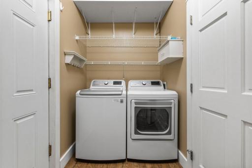 The main floor laundry is located between the kitchen and garage