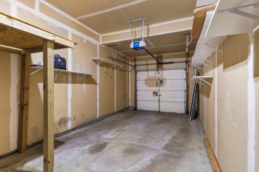 The garage is extra deep and is located adjacent to the laundry room on the main floor