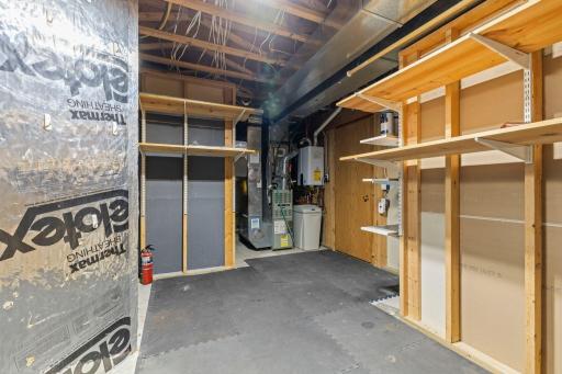 The mechanical room and storage space are located on the lower level