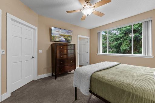 This bedroom has direct access to the main floor bath, and features a large walk-in closet