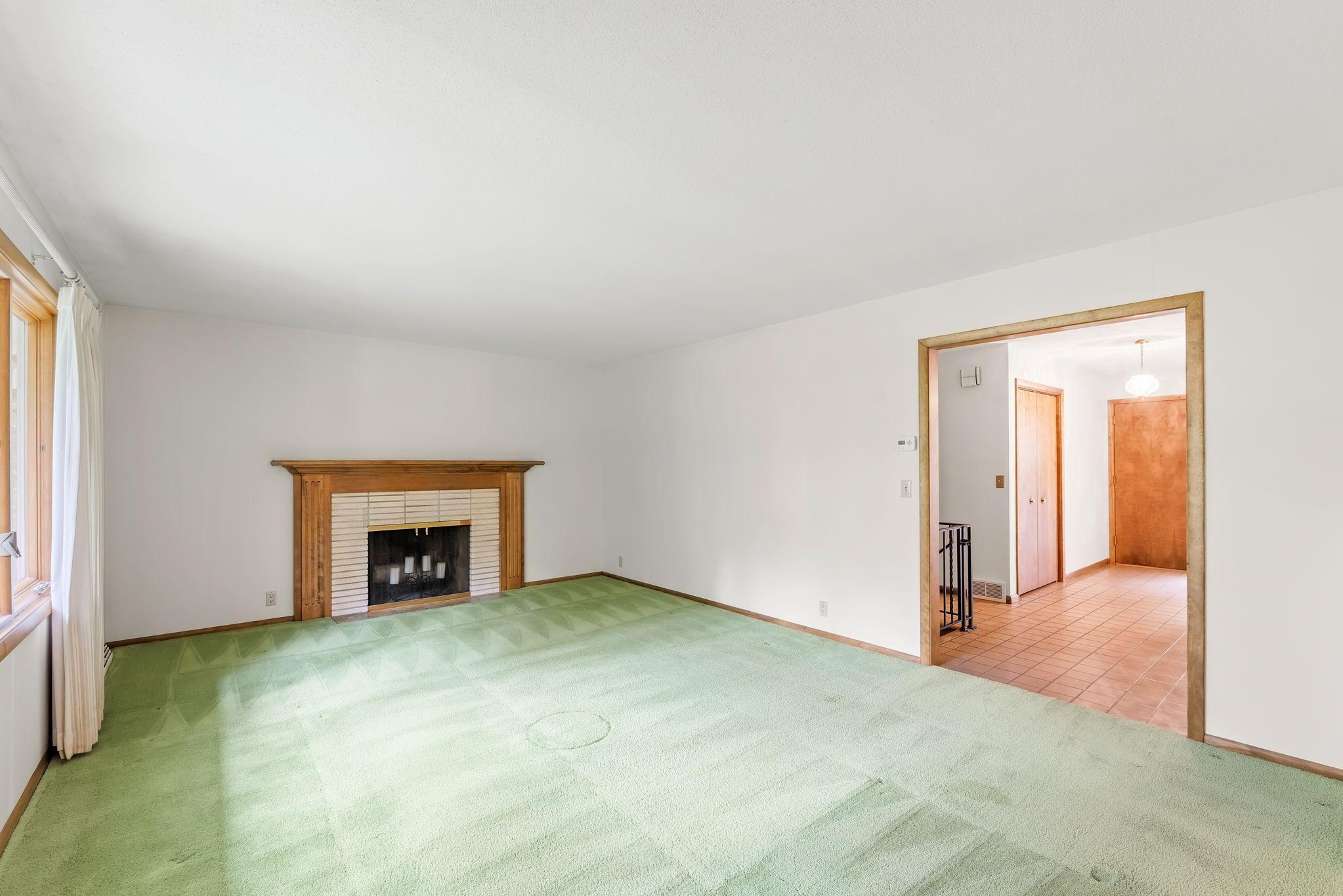 The large foyer brings you into the living room