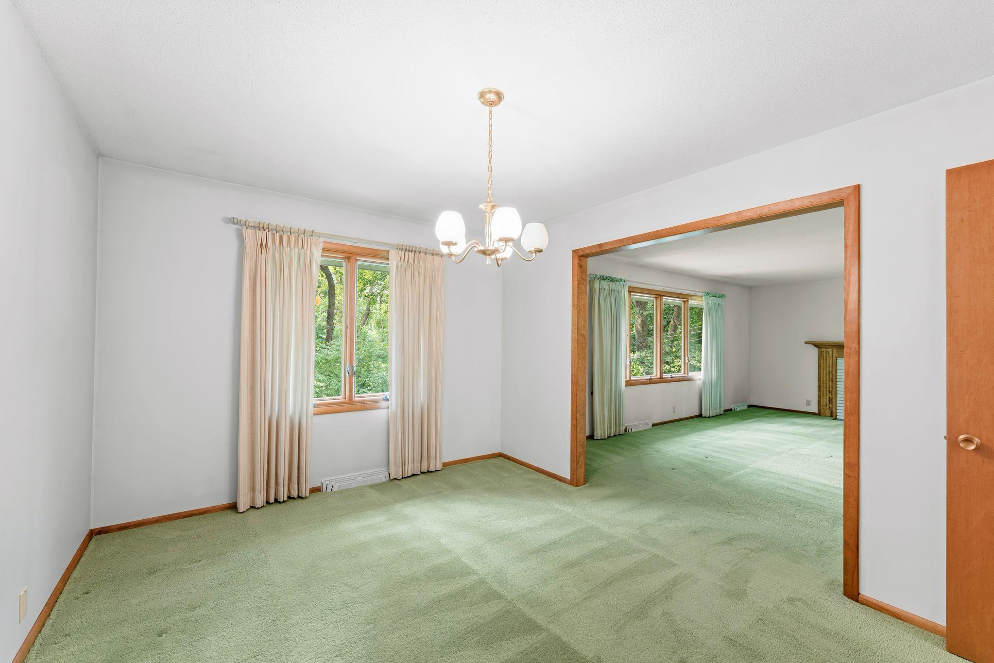 The large formal dining room opens up into the living room, providing extra space for large gatherings