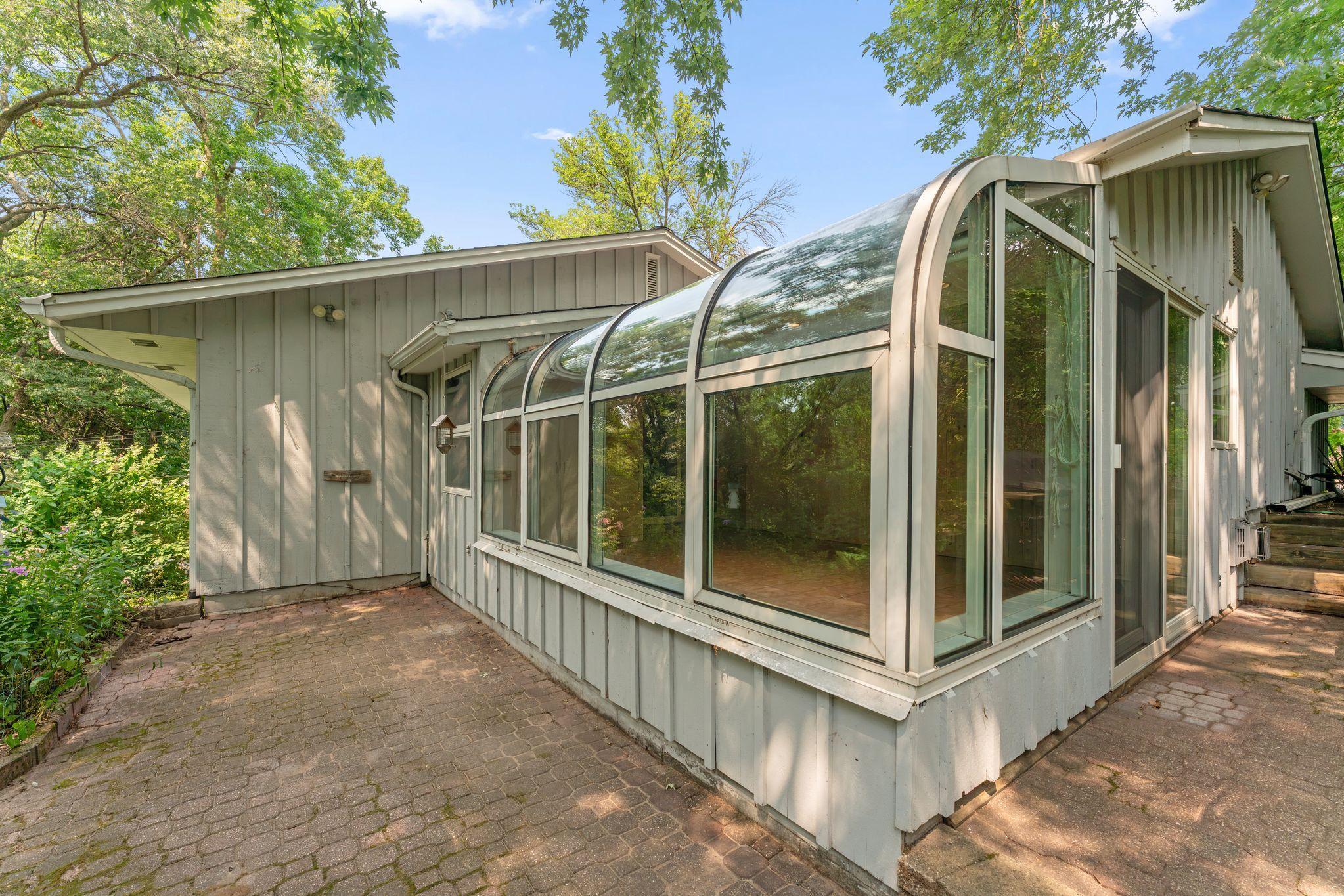 Four Season Solarium with easy access to the back yard patio through the sliding glass door