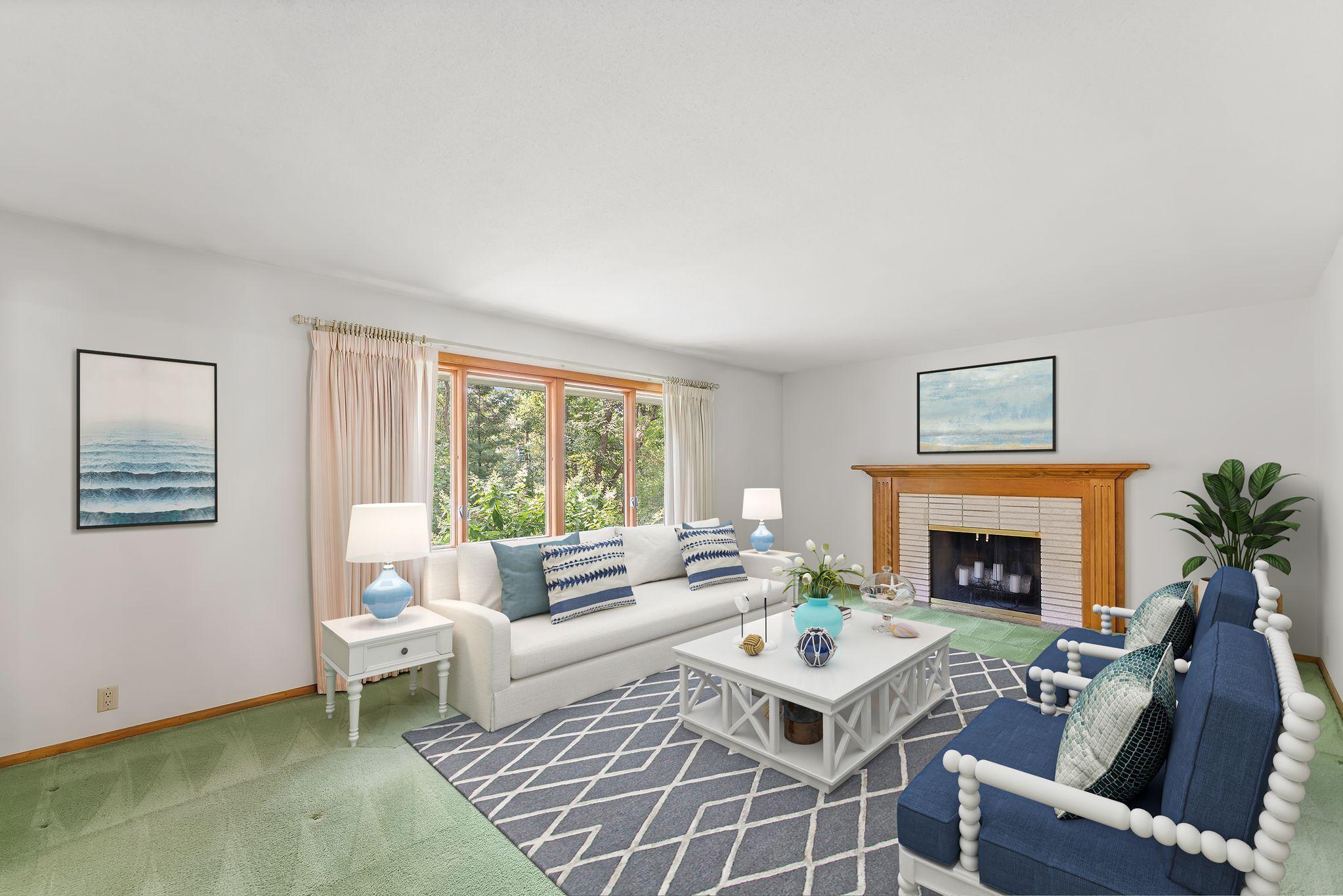 A cozy fireplace and lots of light makes this room perfect for relaxing and entertaining