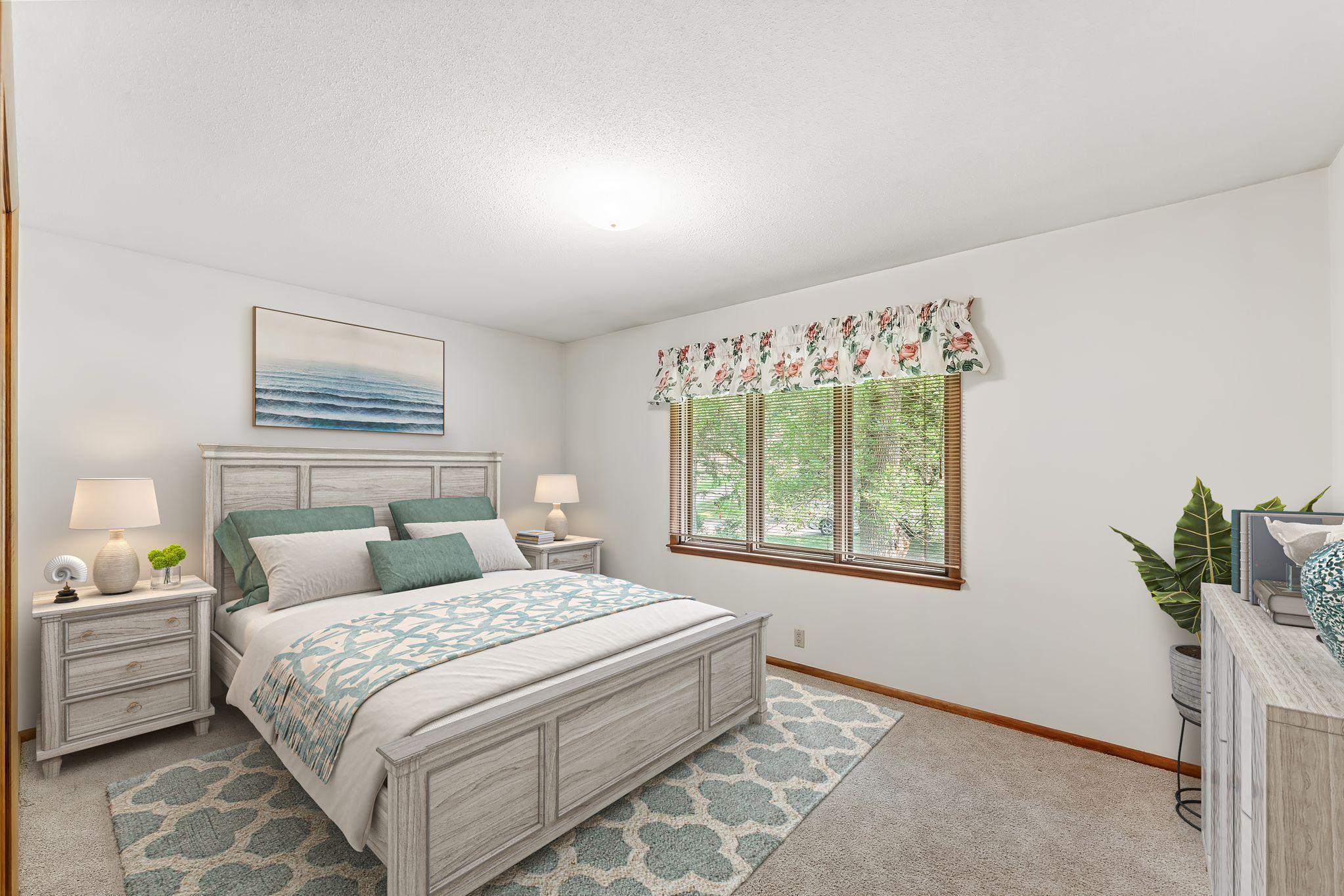Virtually staged 2nd bedroom on the main level
