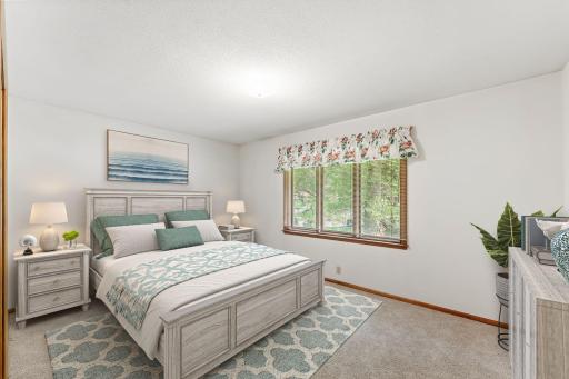 Virtually staged 2nd bedroom on the main level